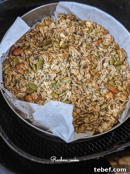 Crunchy Air Fryer Granola Recipe for Perfect Homemade Clusters 10 Toasted granola in air fryer basket after air frying