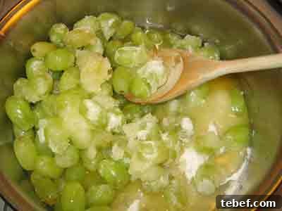 Greek Grape Spoon Sweet (Stafydi Gliko) Recipe 3 Stir ingredients for greek spoon sweet recipe for stafyli gliko.