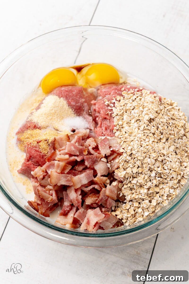 Bourbon-Glazed Bacon Meatloaf Recipe 2 all the ingredients are added to a glass bowl