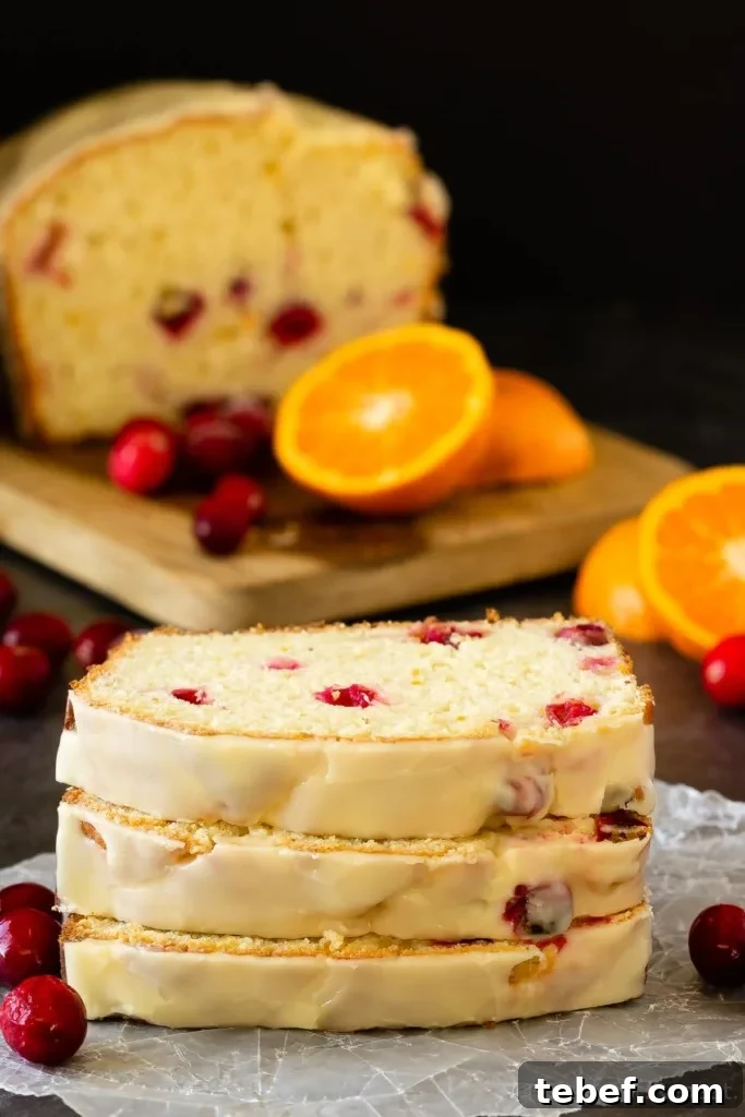 Orange Cranberry Quick Bread Recipe with Zesty Citrus Glaze 5 Orange cranberry bread with a sweet orange glaze