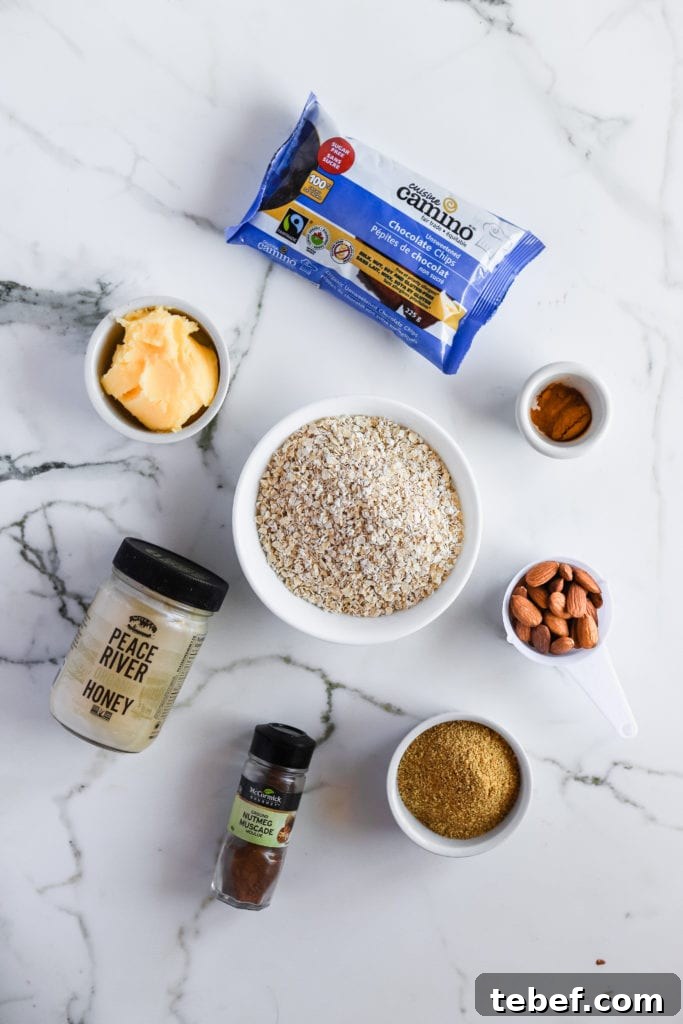 Chocolate Chip Oatmeal Cookie Granola: Crunchy Homemade Recipe 5 top down view of the ingredients needed for chocolate chip cookie granola