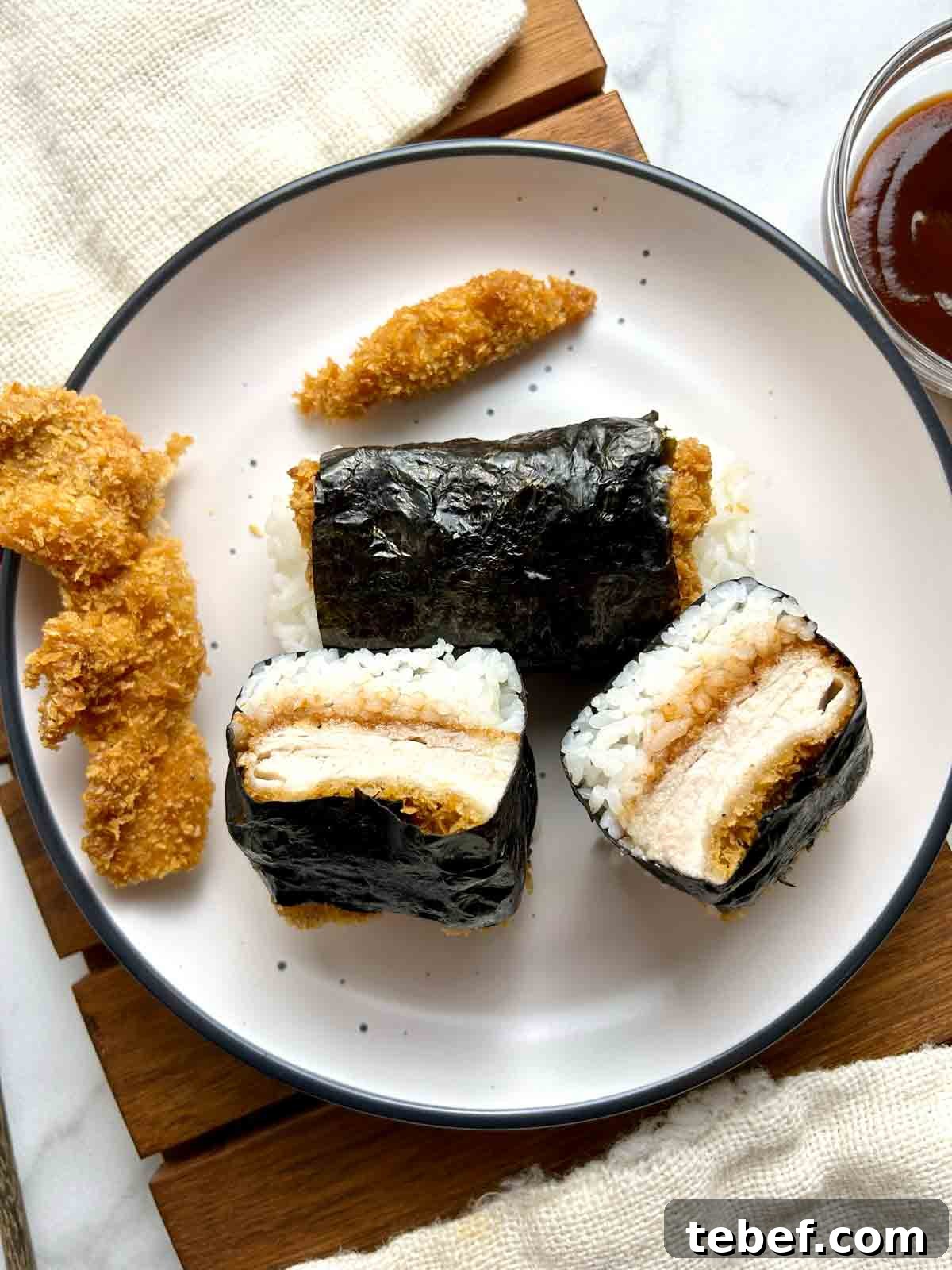 Chicken Katsu Musubi Recipe: How to Make Japanese Fried Chicken Rice Balls 2 overhead shot of sliced chicken katsu musubi