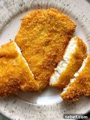 overhead shot of sliced fish katsu on plate