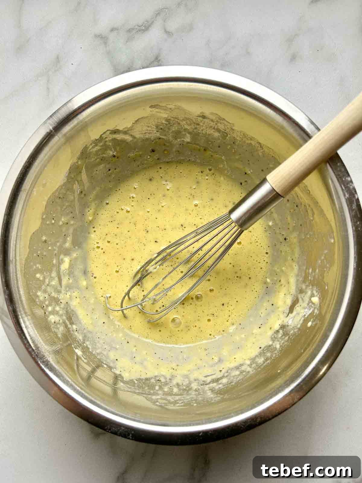 Chicken Katsu Musubi Recipe: How to Make Japanese Fried Chicken Rice Balls 7 dredge ingredients being whisked in bowl