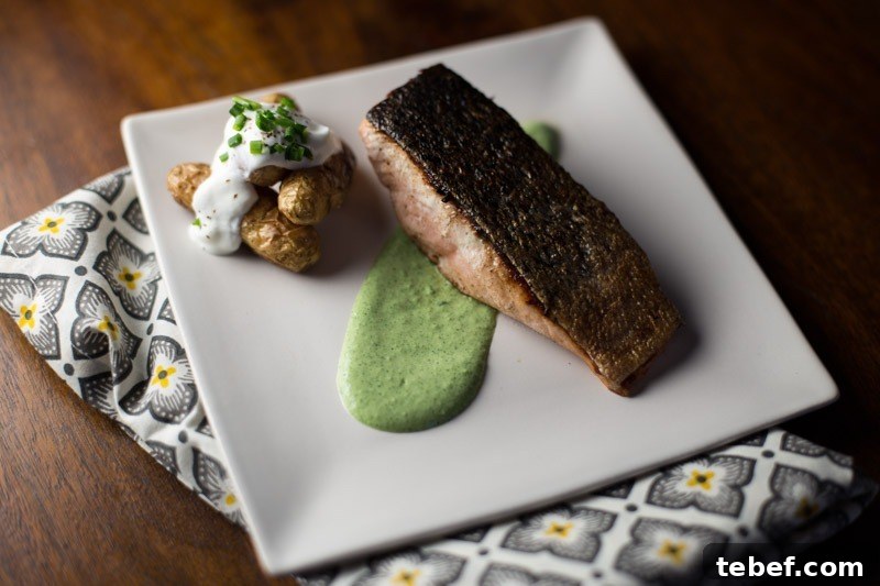 Plated Crispy Skin Salmon with Jalapeño Crème Fraiche