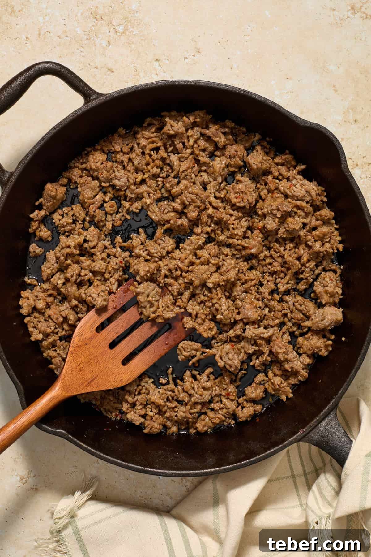 Sun-Dried Tomato Pasta with Savory Italian Sausage 5 Italian sausage browned in cast iron skillet.