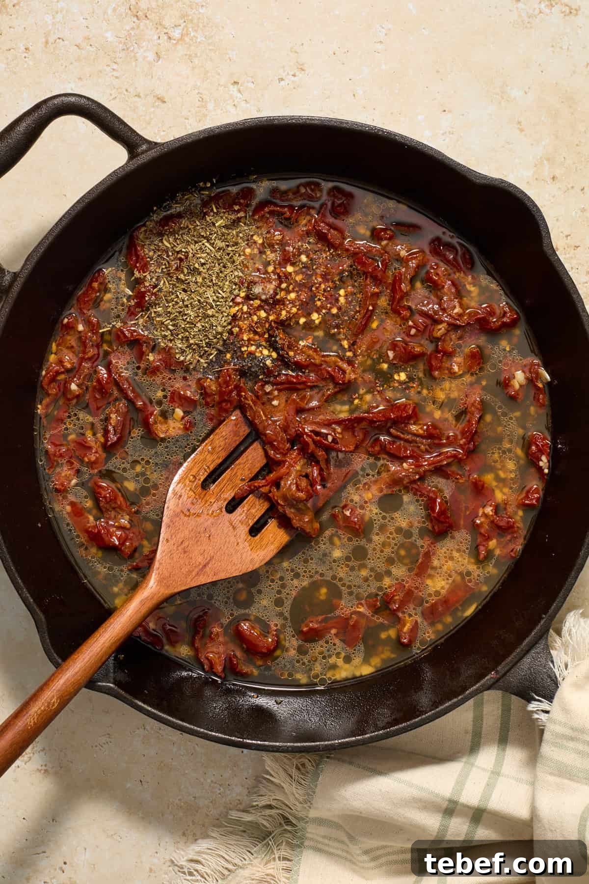 Sun-Dried Tomato Pasta with Savory Italian Sausage 8 Broth and seasoning added to skillet with sun-dried tomatoes and garlic.