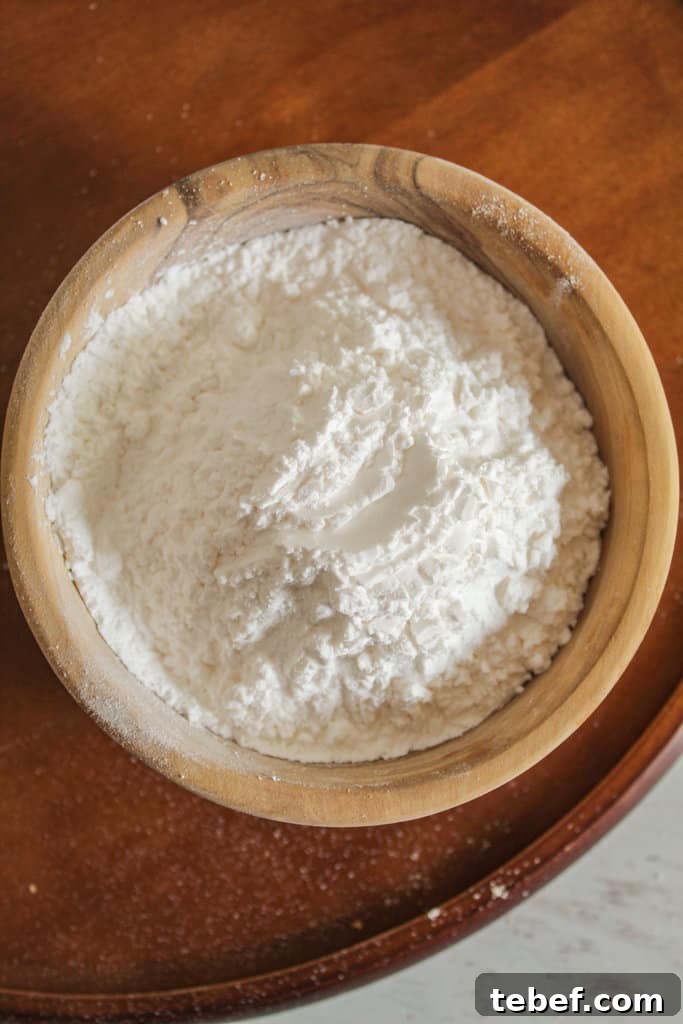 Almond Flour Substitutes: Top Alternatives and How to Use Them 8 overhead shot of a wooden bowl of tapioca starch.