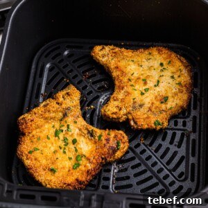 Crispy Gluten-Free Pork Chops in the Air Fryer 11 Golden crispy gluten free pork chops in the air fryer basket