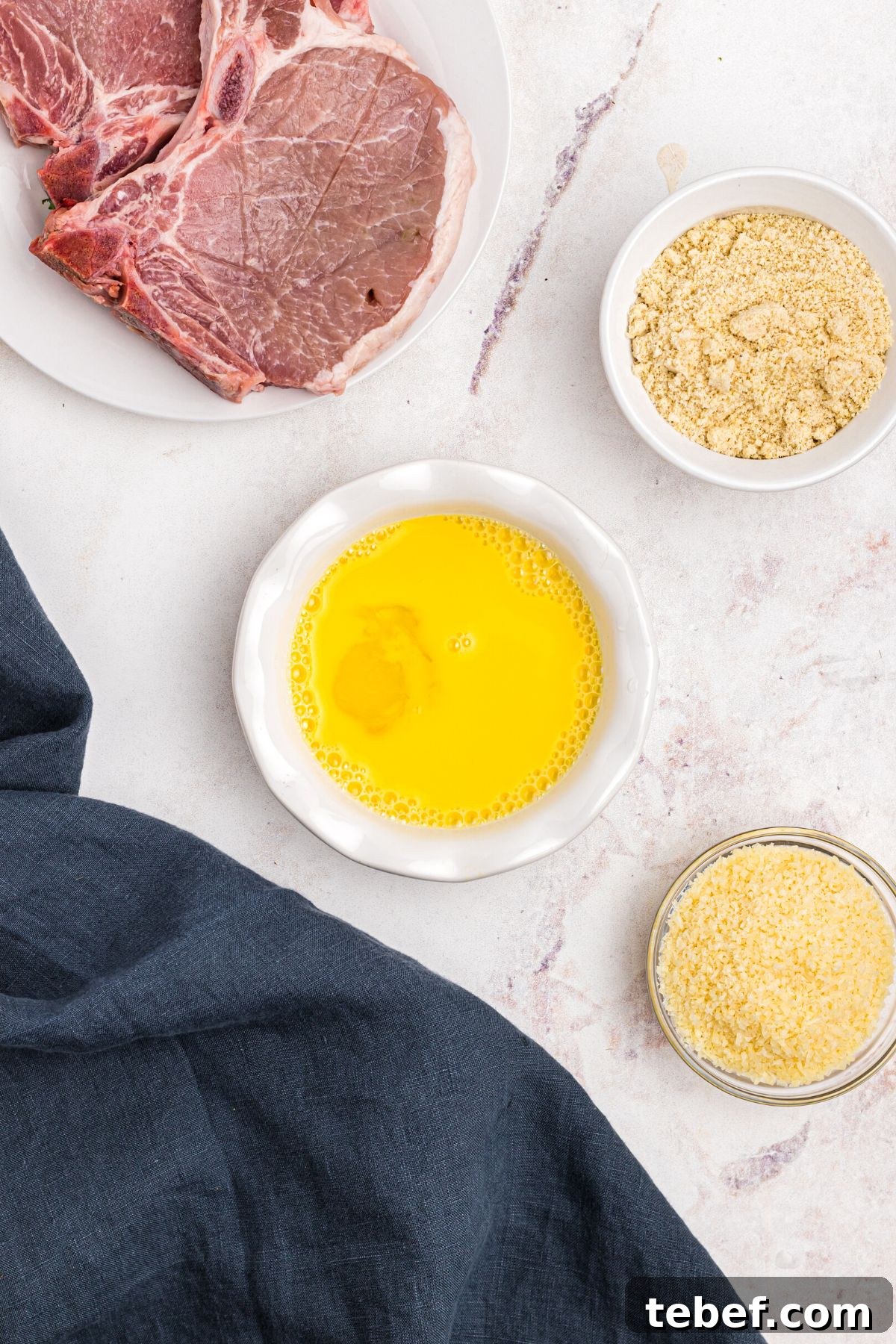 Crispy Gluten-Free Pork Chops in the Air Fryer 4 Whisked egg and water in a small white bowl