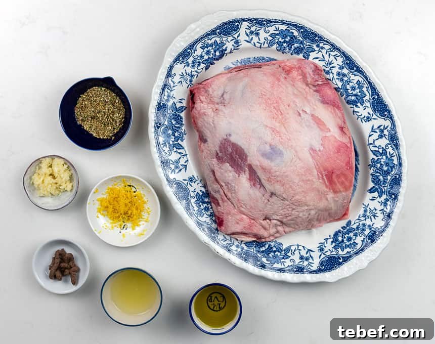 oregano, garlic, lemon juice, olive oil, lemon zest with platter of raw lamb on the side