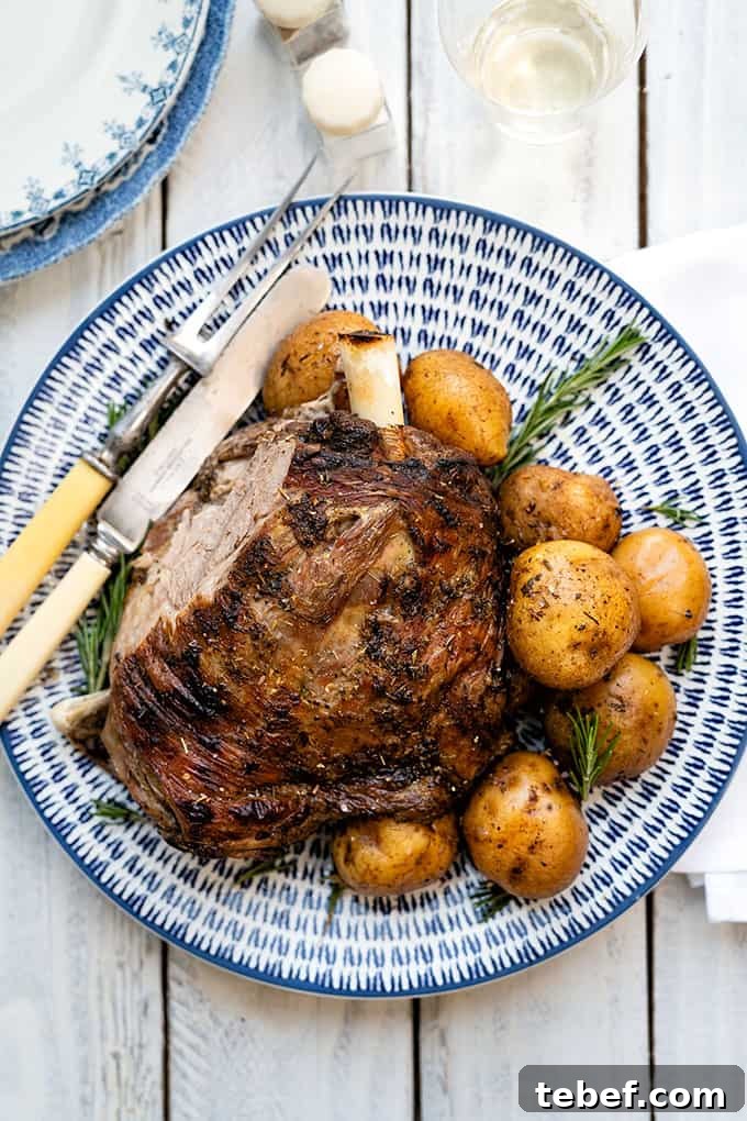 Platter of Greek roast lamb kleftiko with potatoes and rosemary