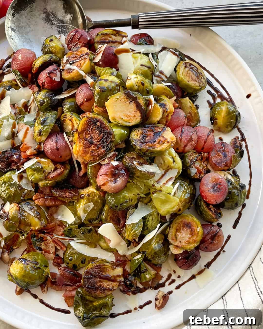Roasted Brussels Sprouts with California Grapes and Crispy Bacon 4 Primal Gourmet Roasted Brussels Sprouts with Grapes Bacon Pecans and Parmesan