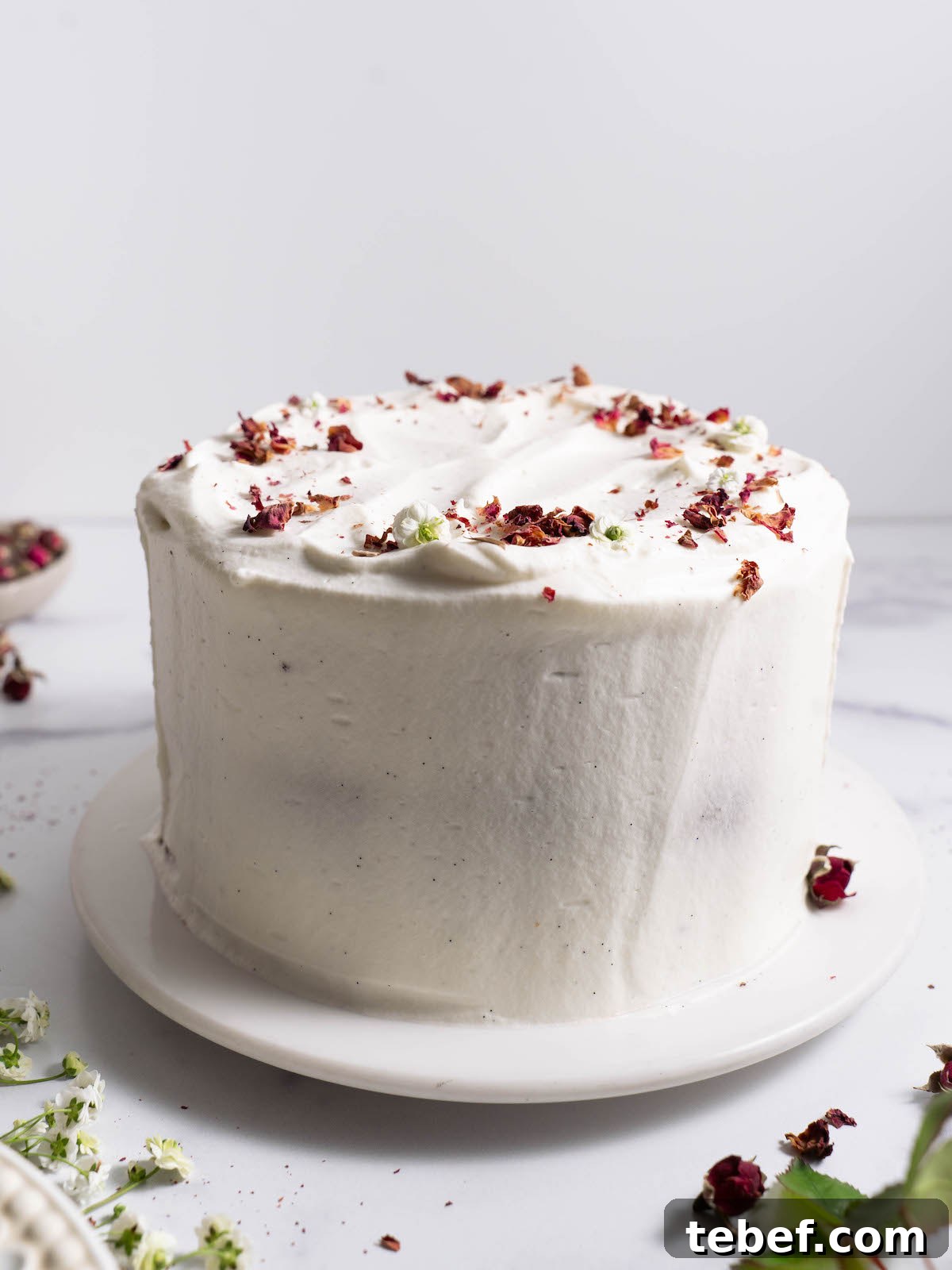 Chocolate Rose Cake with Vanilla Whipped Cream Recipe 7 A whole chocolate rose cake frosted with vanilla whipped cream