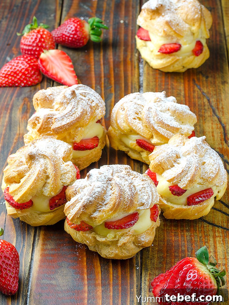Strawberry Cream Puffs Recipe with Light Whipped Filling 4 Strawberry Cream Puffs at the Table