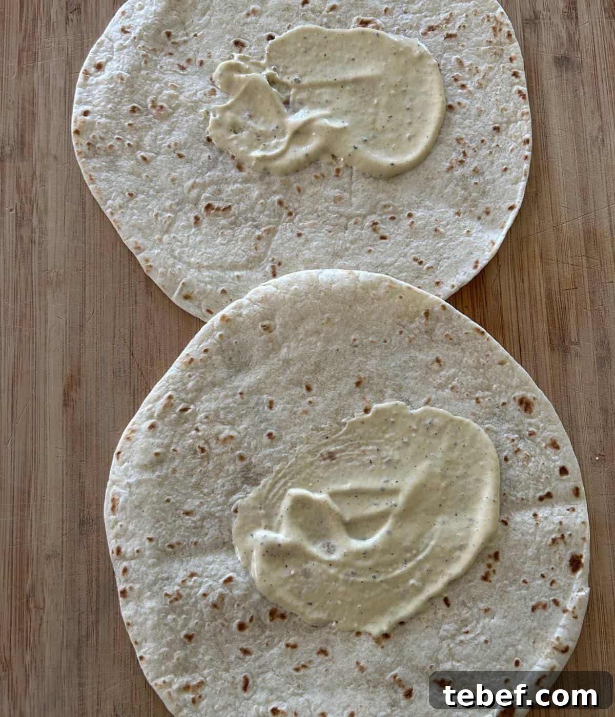Classic Ham and Cheese Wrap Recipe for Quick Lunch or Snack 5 Dijon spread on tortillas.