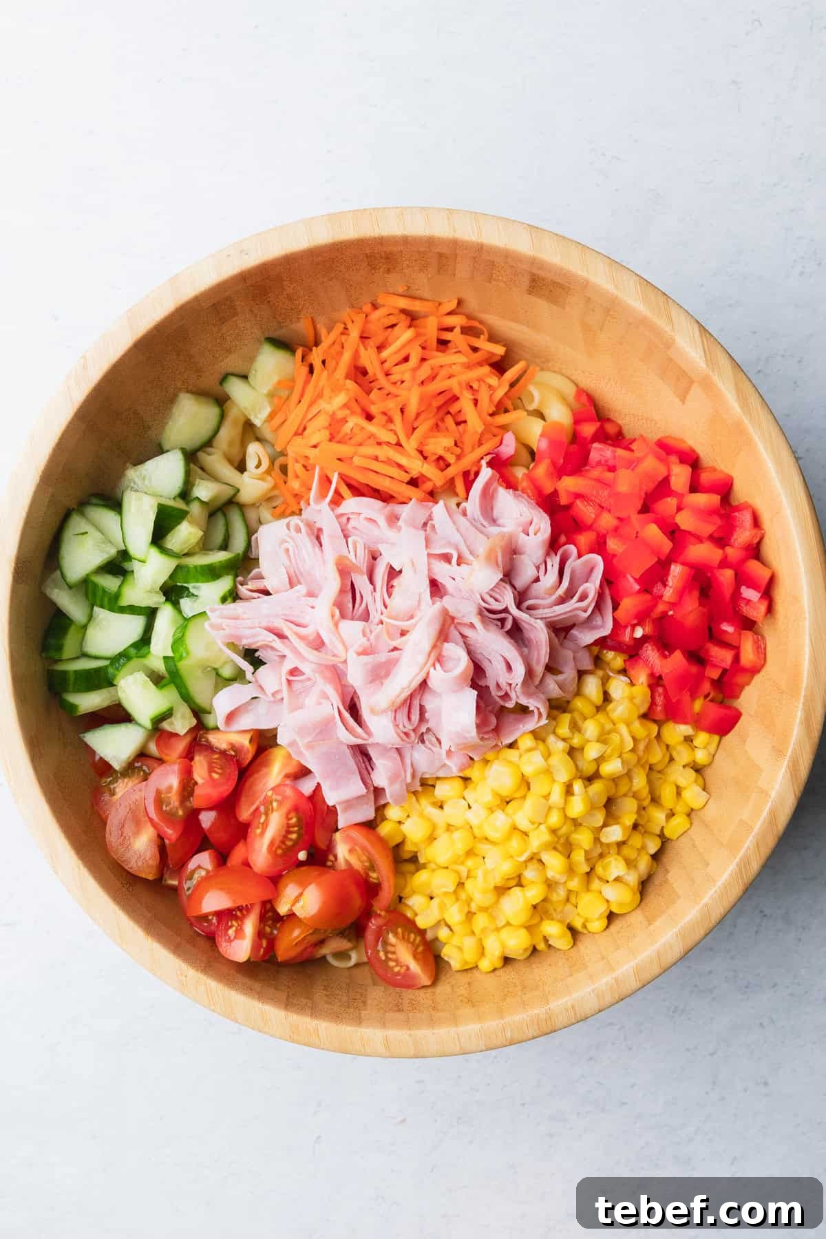 Mexican Macaroni Salad with Ham and Creamy Pepita Dressing 6 The salad ingredients in a bowl.