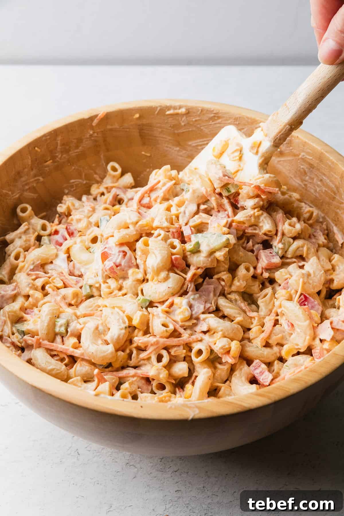 Mexican Macaroni Salad with Ham and Creamy Pepita Dressing 9 Macaroni salad mixed with creamy chili lime dressing.