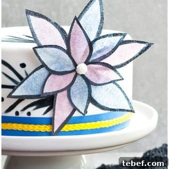 Edible Easy Wafer Paper Flowers on White Fondant Cake With Gray Background