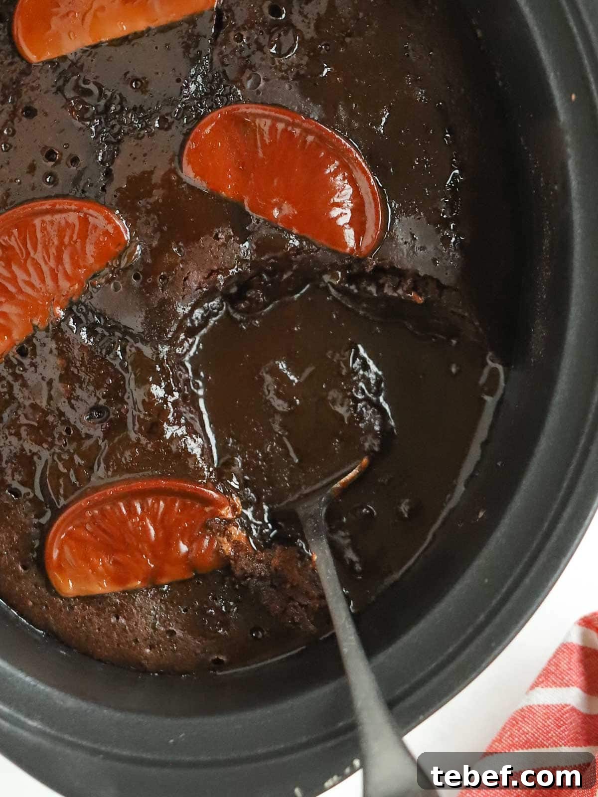 Slow Cooker Chocolate Orange Pudding Recipe 4 Close up of slow cooker pan with chocolate orange pudding inside.