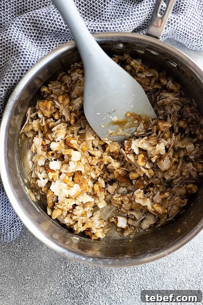 Overhead view of lazy daisy frosting in a pan ready to spread onto a cake. 