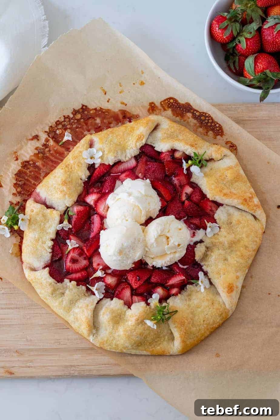 Rustic Strawberry Galette Recipe: Flaky Crust and Fresh Filling 11 strawberry galette with scoops of vanilla ice cream