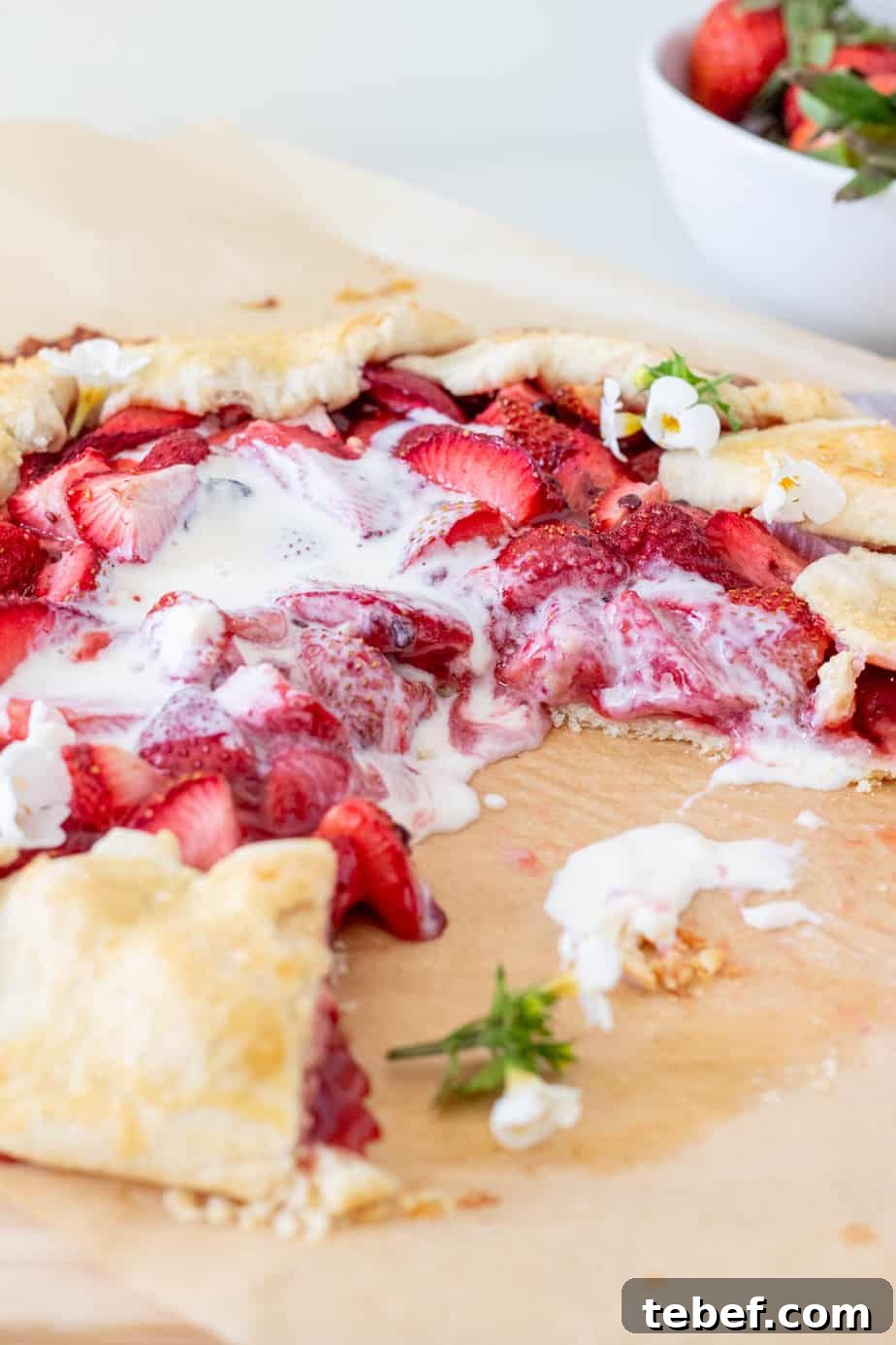 Rustic Strawberry Galette Recipe: Flaky Crust and Fresh Filling 3 strawberry galette with melted ice cream on top