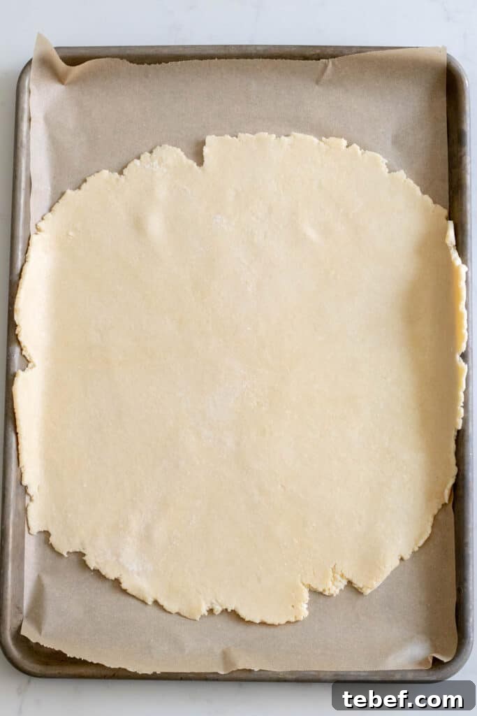 Rustic Strawberry Galette Recipe: Flaky Crust and Fresh Filling 5 circle of pie dough on baking sheet