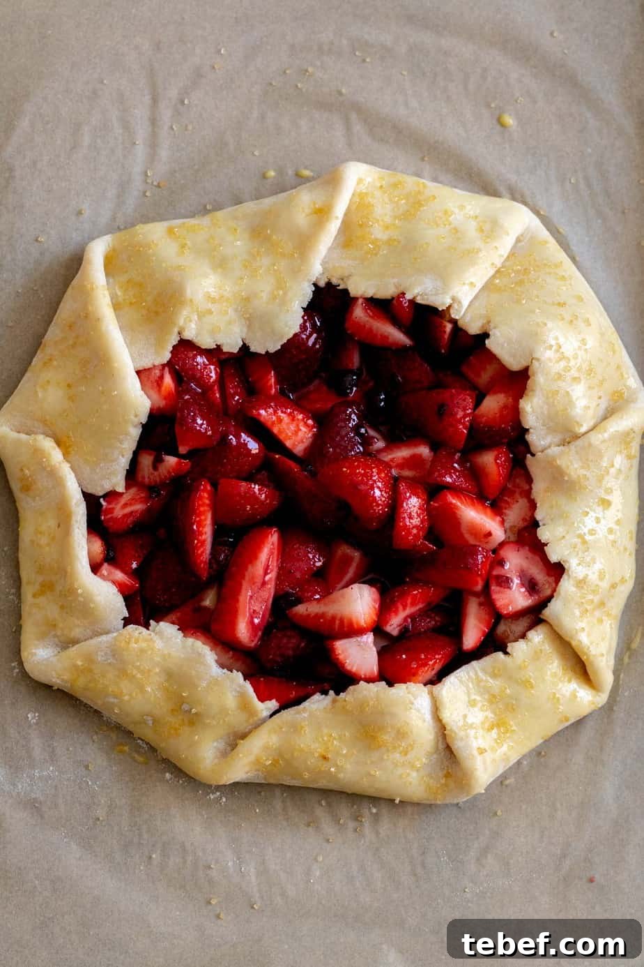 Rustic Strawberry Galette Recipe: Flaky Crust and Fresh Filling 9 Strawberry galette with edges of dough egg washed