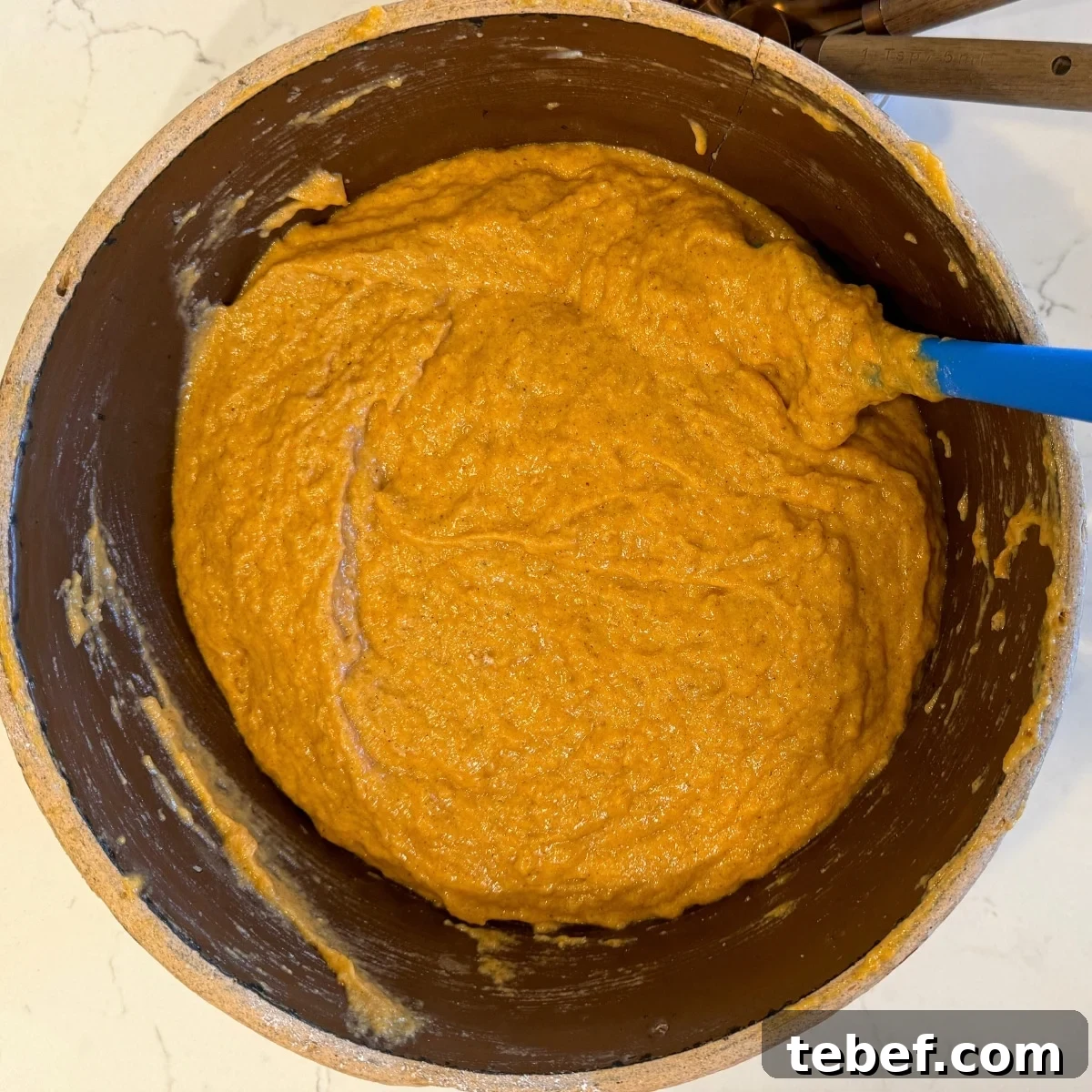 Moist Sourdough Pumpkin Bread Recipe for Fall Baking 4 sourdough pumpkin bread dough in mixing bowl