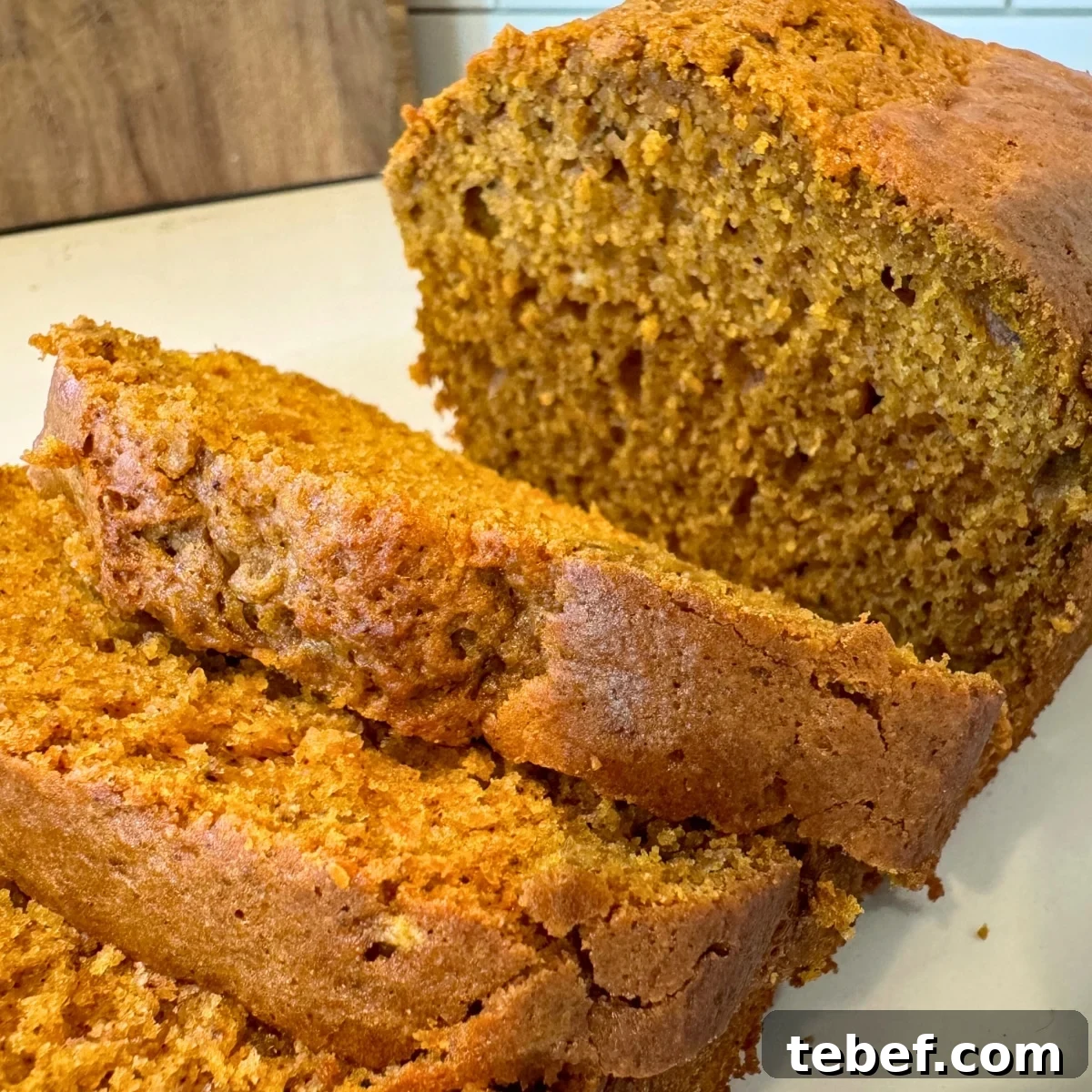 Moist Sourdough Pumpkin Bread Recipe for Fall Baking 7 a moist sourdough pumpkin bread loaf sliced