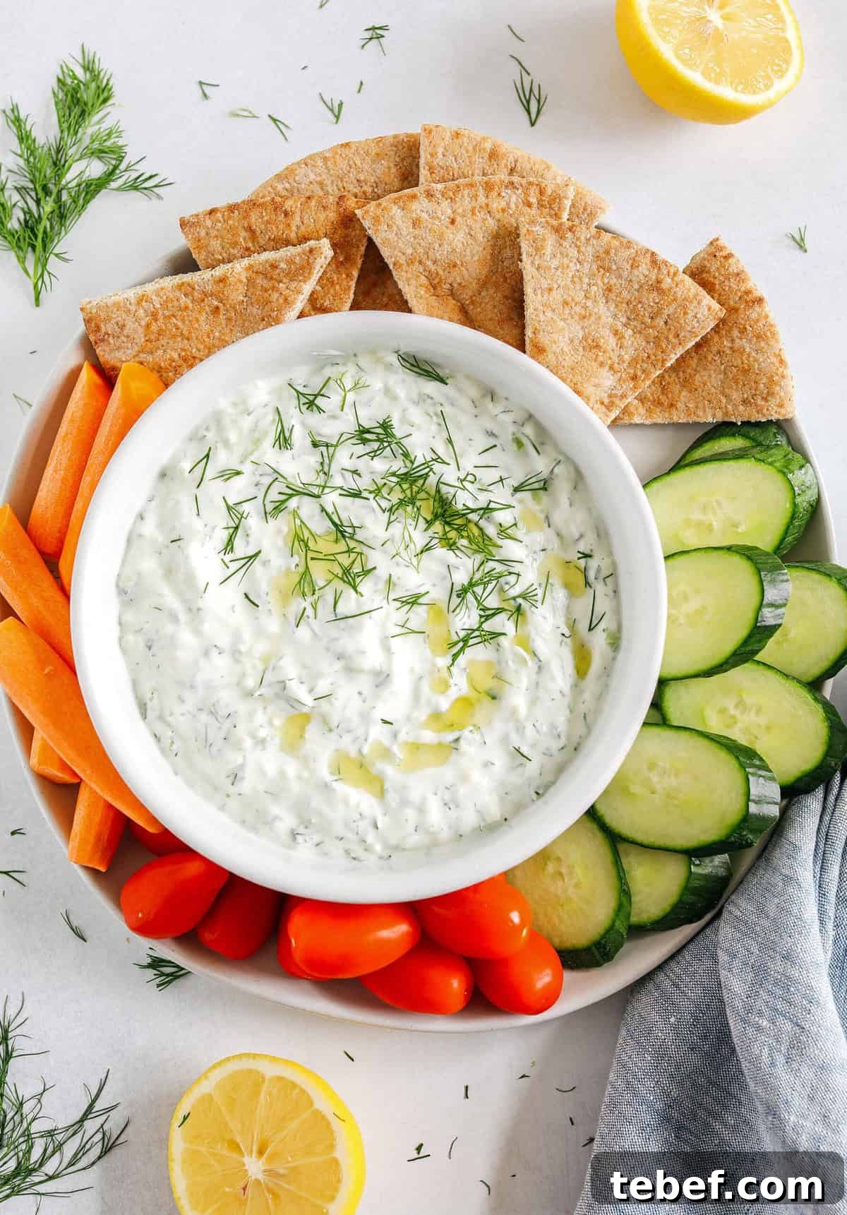 Authentic Homemade Tzatziki Recipe — Creamy Greek Sauce Guide 2 Fresh and flavorful Homemade Tzatziki Sauce is a creamy yogurt-based sauce perfect for the summer served with kabobs, grilled veggies, pita bread and more!