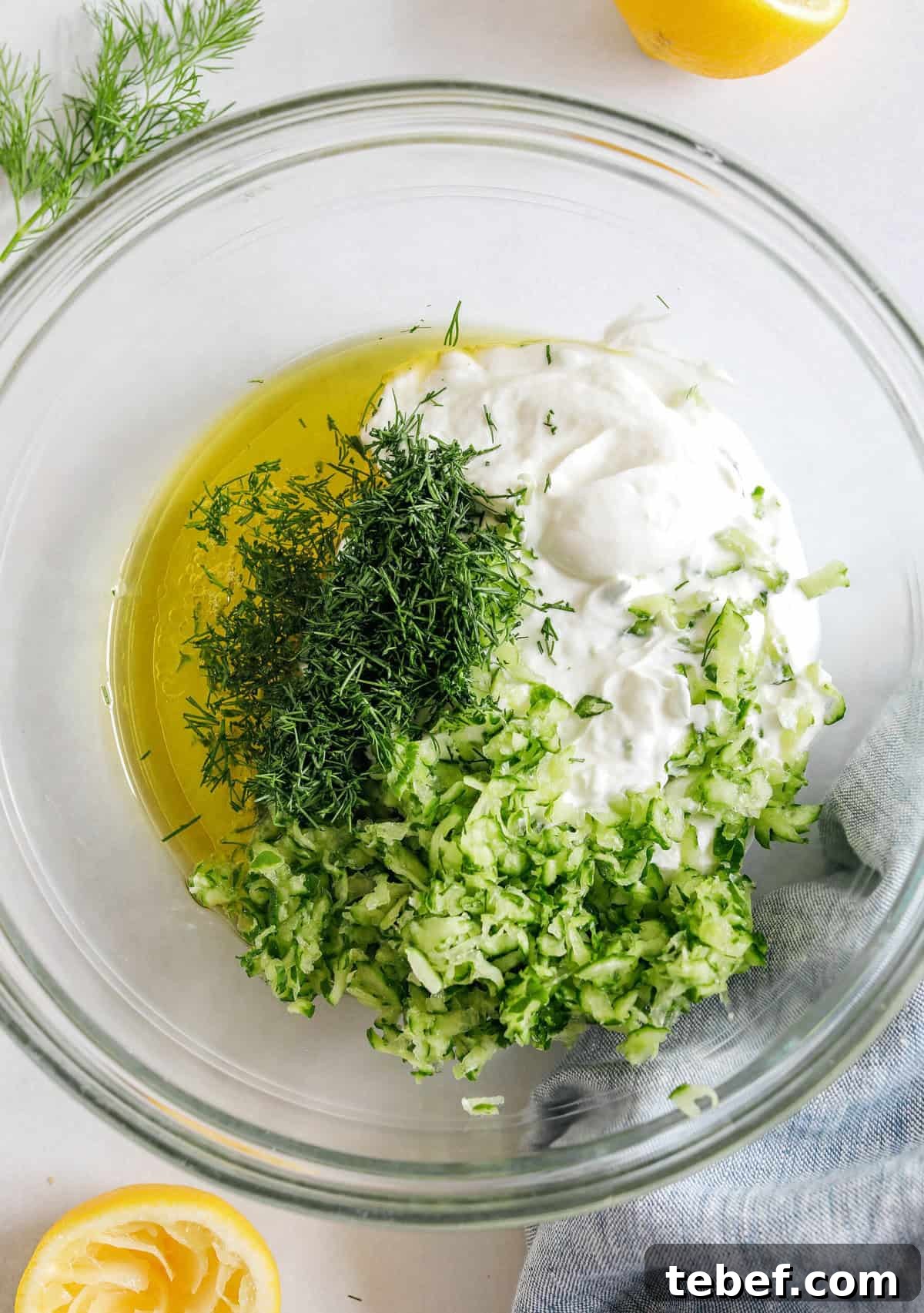Authentic Homemade Tzatziki Recipe — Creamy Greek Sauce Guide 3 Homemade Tzatziki Sauce served with pita and veggies