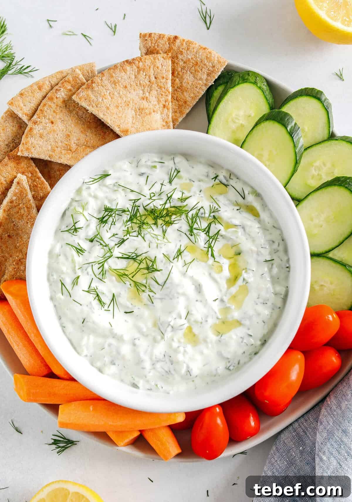 Authentic Homemade Tzatziki Recipe — Creamy Greek Sauce Guide 5 Tzatziki with pita and vegetables