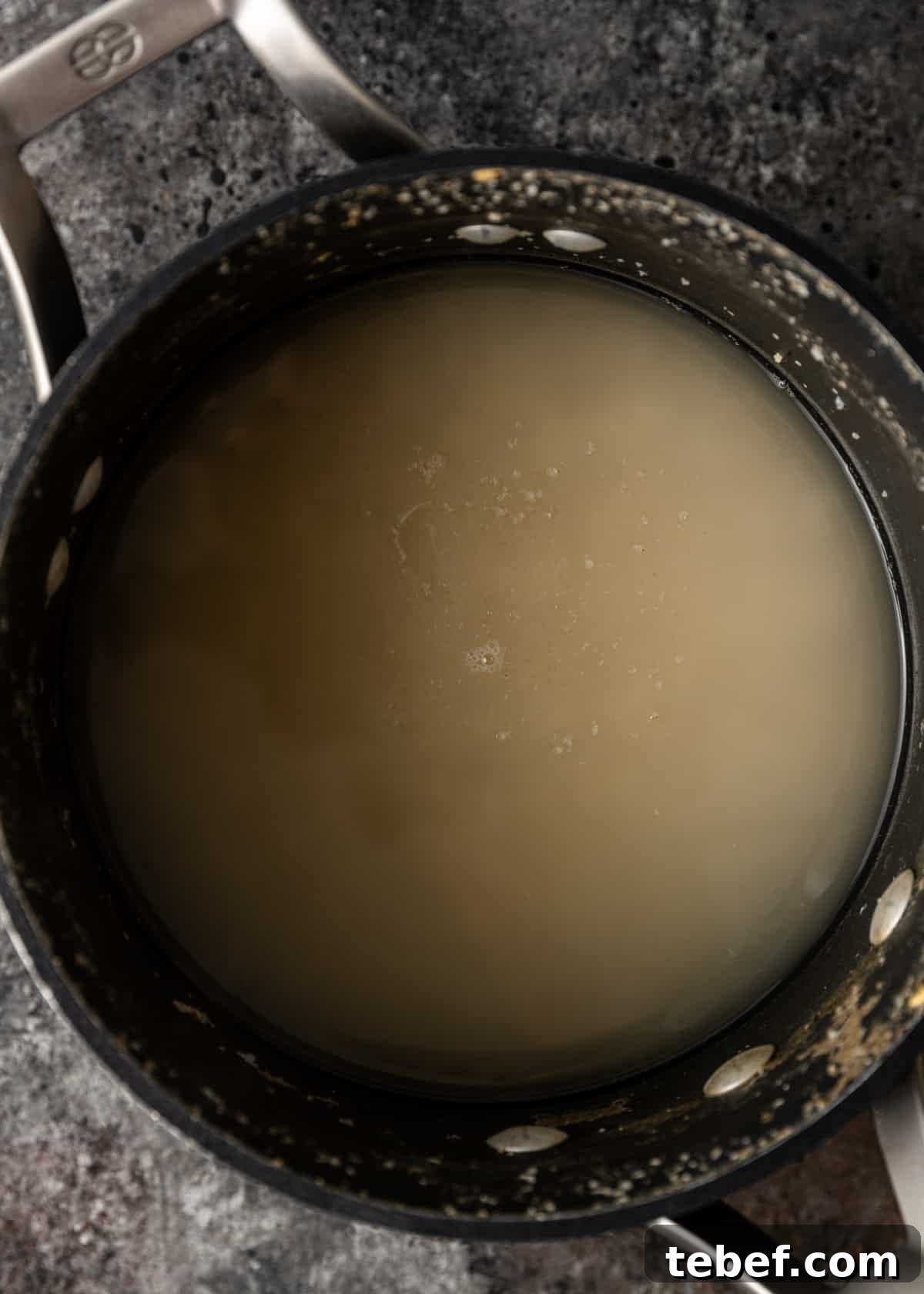 Perfectly Fluffy Brown Rice: Simple Step-by-Step Cooking Guide 4 liquid in a pan