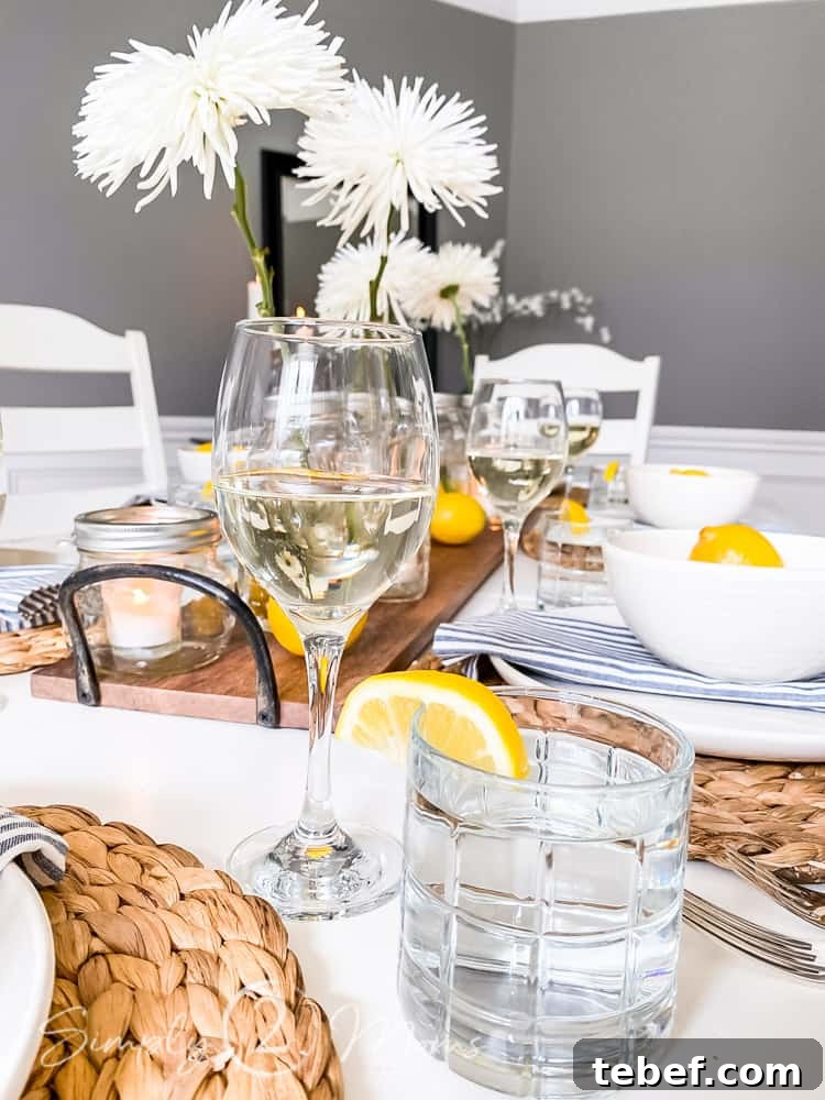 Chic Summer Dinner Party Ideas to Impress Your Guests 11 wine glass and water glass as part of place setting for summer tablescape idea