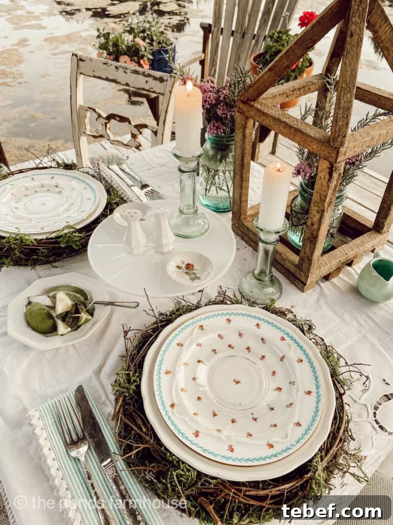 Chic Summer Dinner Party Ideas to Impress Your Guests 15 outdoor table set with candles and wood lanterns