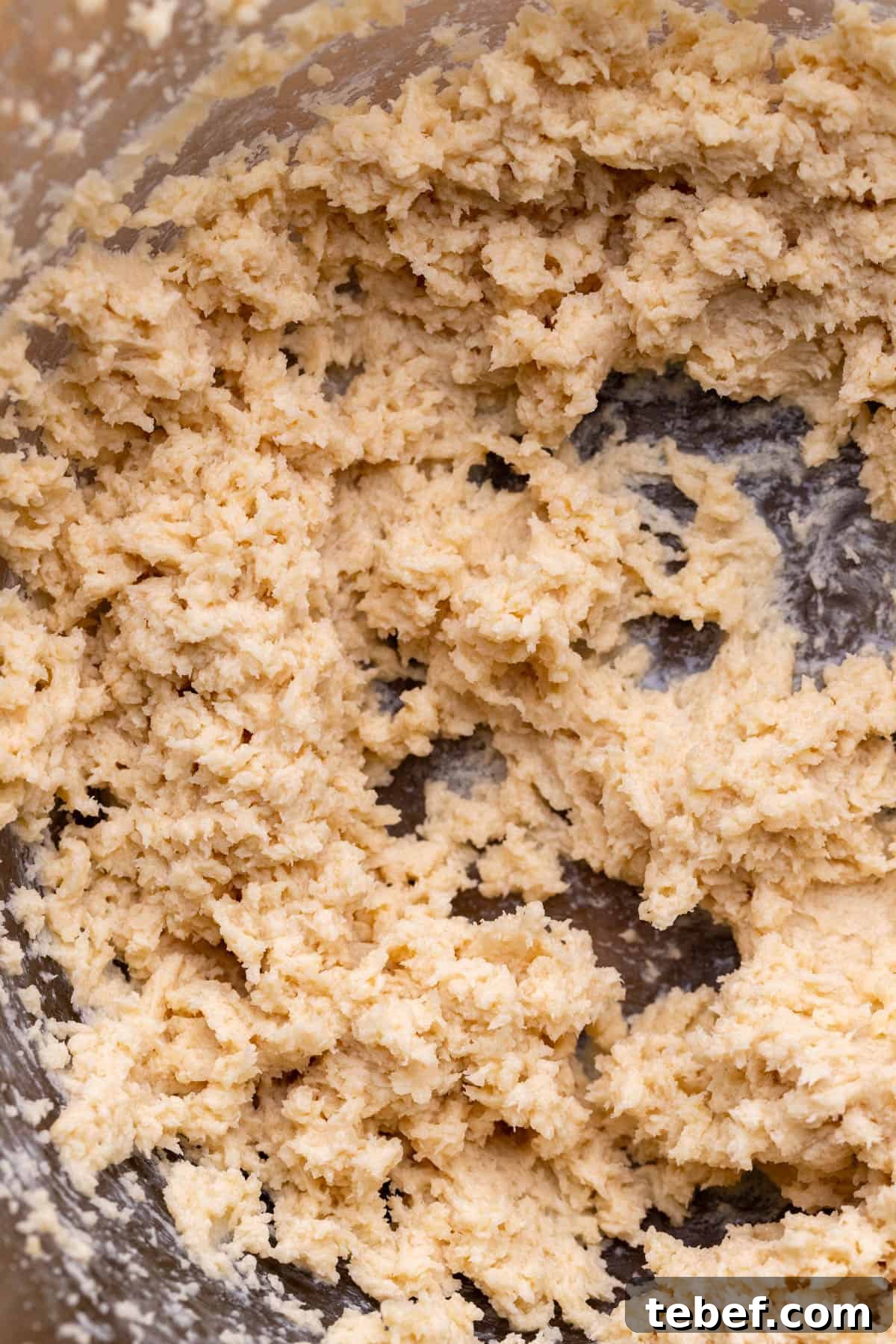 Cookie Dough Brownies Recipe: Fudgy Brownies with Edible Cookie Dough 8 Wet ingredients in a bowl.