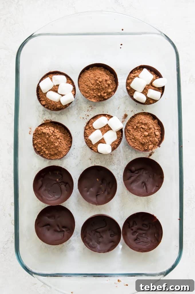 Vegan Hot Chocolate Bombs: Dairy-Free Paleo Recipe and How-To 6 Hot chocolate bombs filled with cocoa and marshmallows.