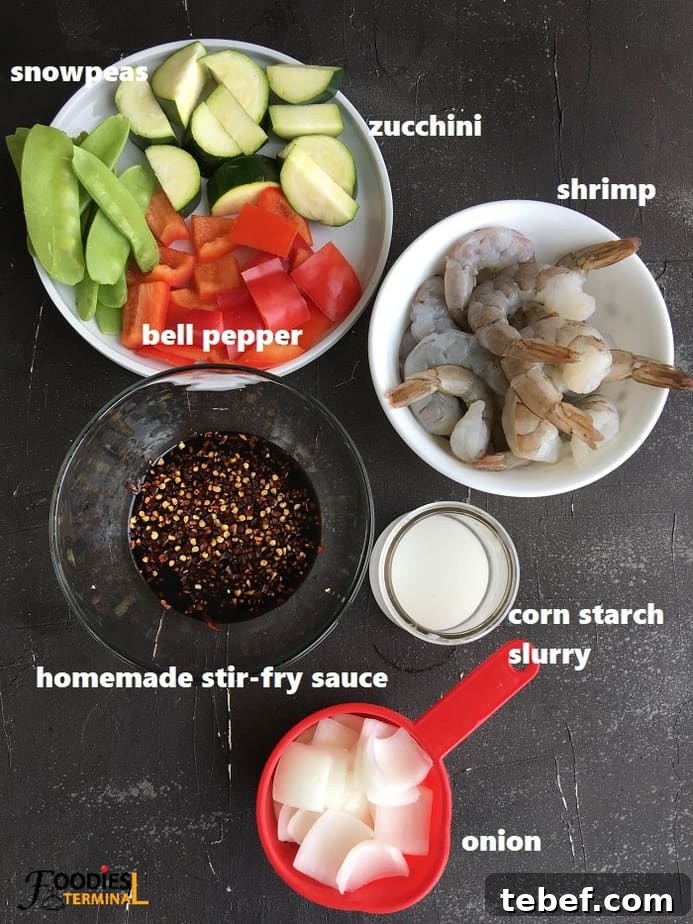 Instant Pot Shrimp Stir-Fry: Quick Garlic Soy Recipe 3 recipe ingredients on a black surface
