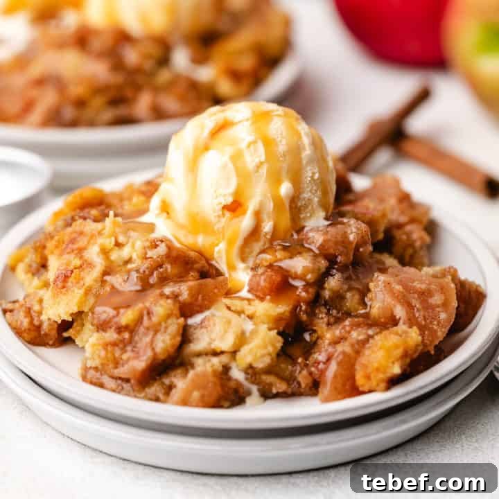 Vanilla ice cream and caramel sauce over apple dump cake.