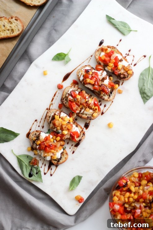 savory ricotta toasts on a white marble serving platter