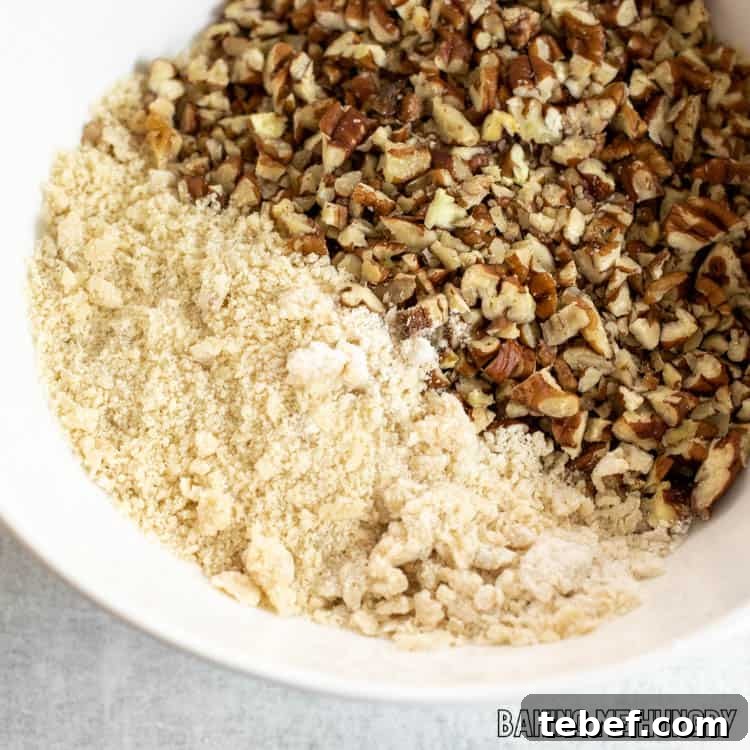 chopped pecans added to crumb topping