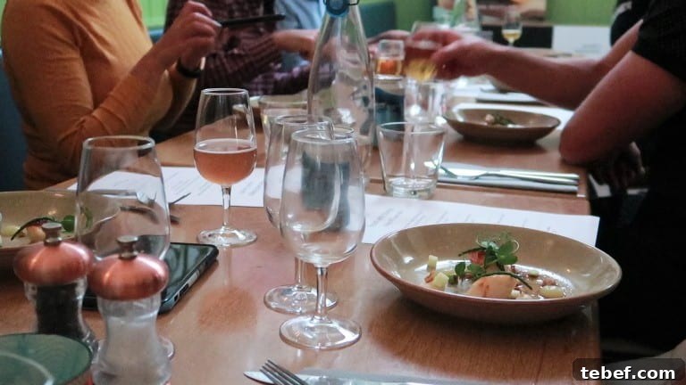 Porthleven Food Festival — Cornwall’s 2019 Seafood & Street Food Guide 4 long table with several people eating and drinking beer at the Porthleven Food Festival 2019