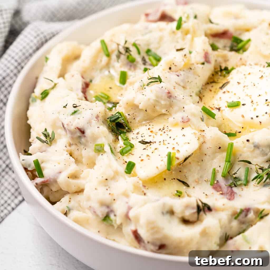 mashed potatoes in bowl with butter on top