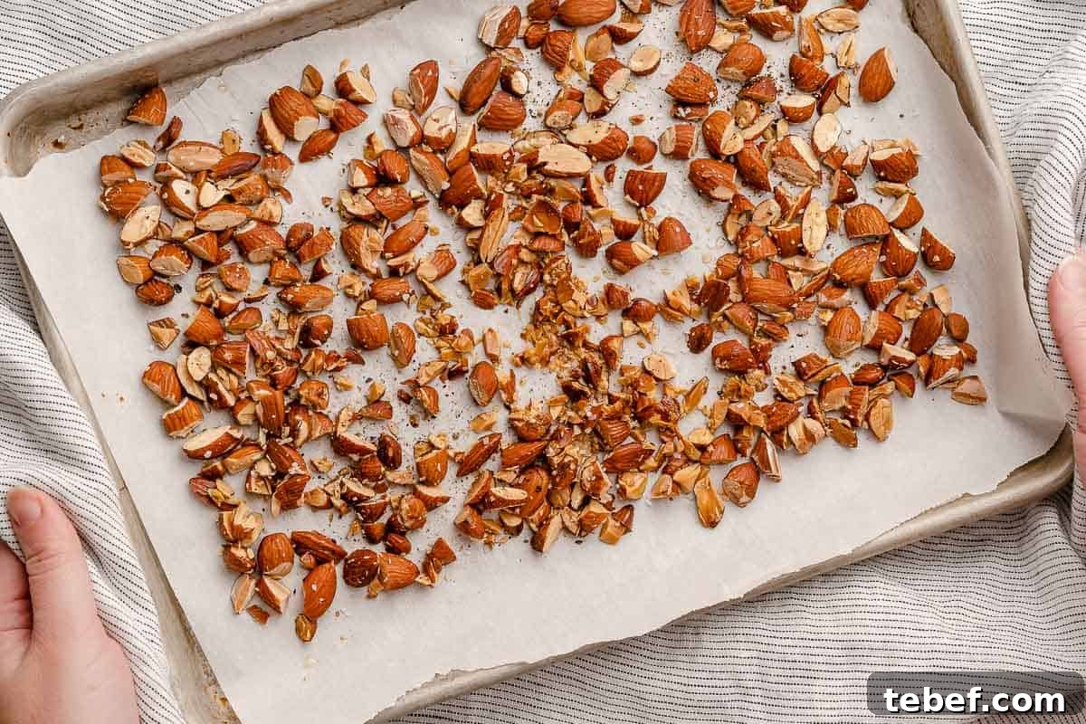 toasted almonds on baking sheet