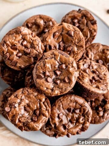 Mini brownie bites on a plate.