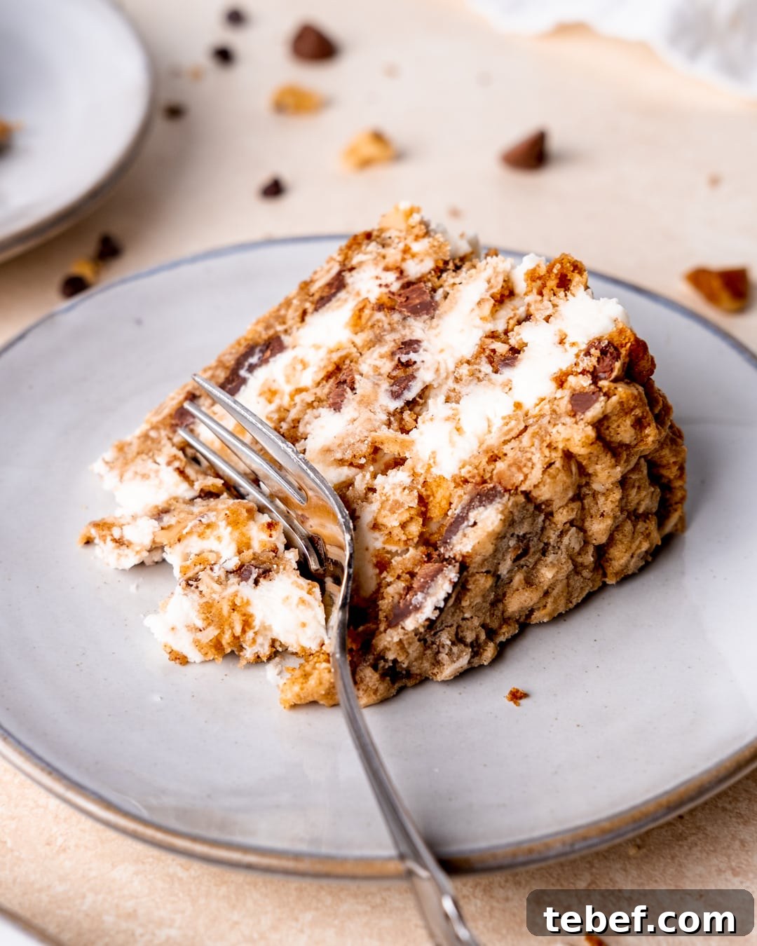 a fork cutting into a slice of cowboy cookie cake