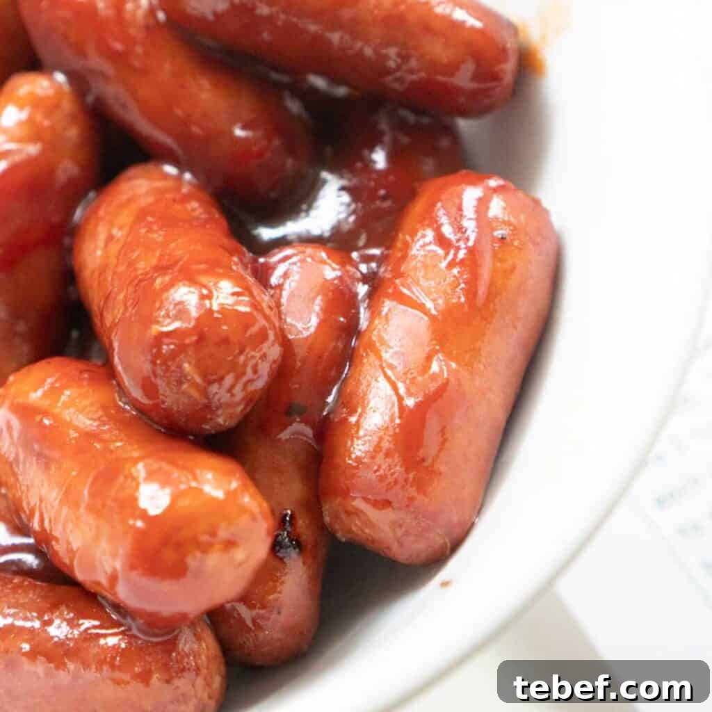 What to Serve with Little Smokies: 10 Delicious Side Dishes 2 close up of little smokies sausages in tangy sauce