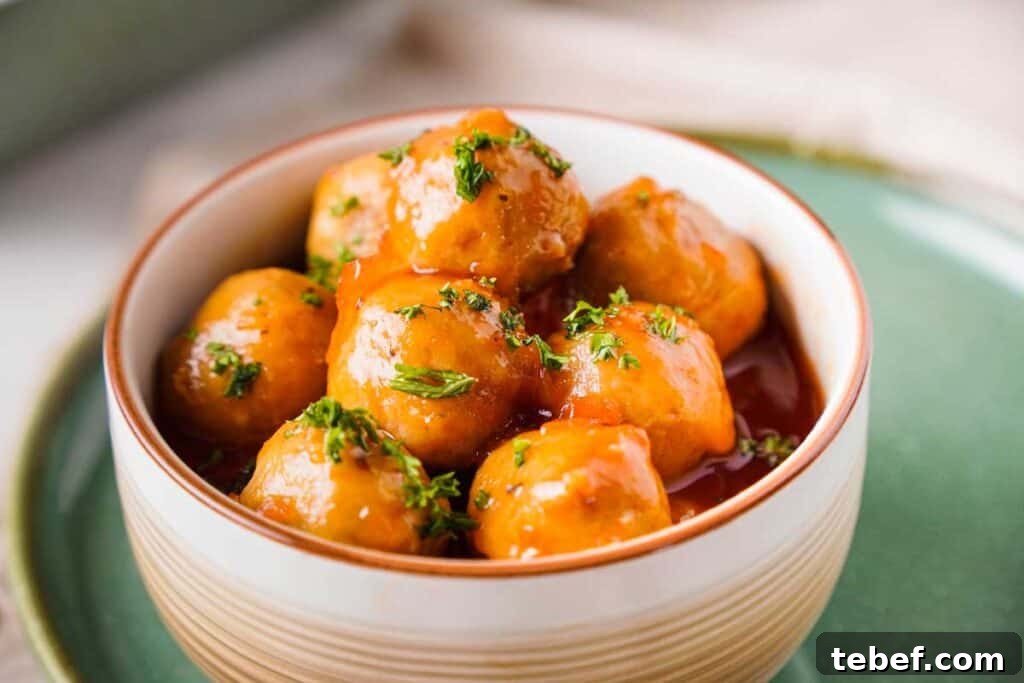 What to Serve with Little Smokies: 10 Delicious Side Dishes 3 apple jelly meatballs in a bowl